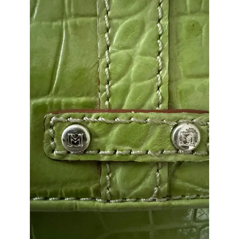 Michael Kors “Natasha” croc embossed leather wallet.